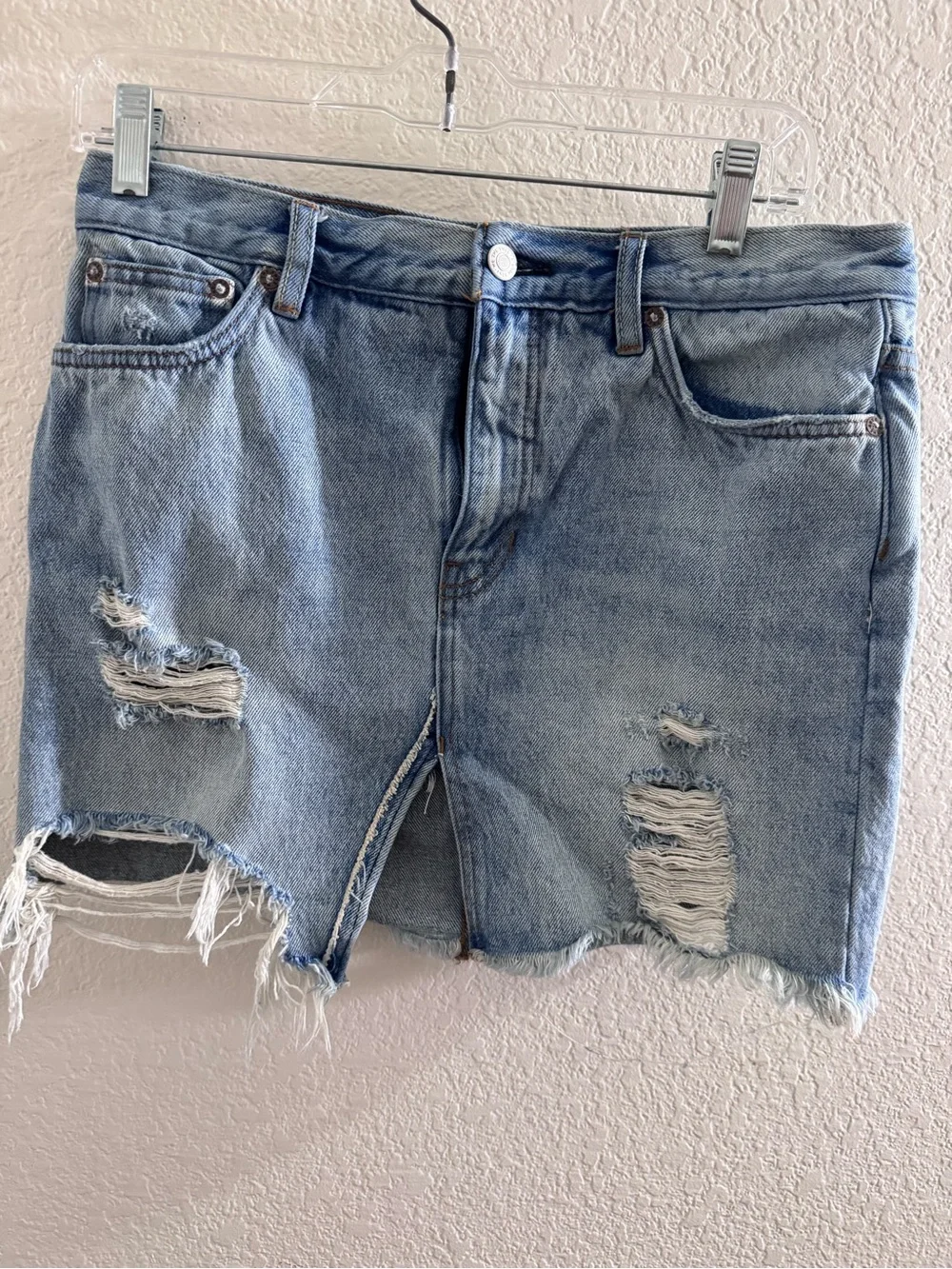Free People We the Free Distressed Denim mini skirt